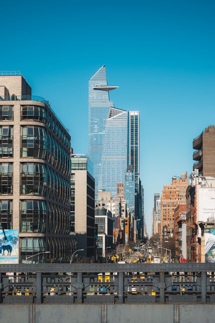 Iconic view of New York City's skyline featuring the Hudson Yards development on a clear day.